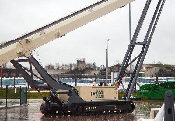 Track-mounted mobile conveyor.